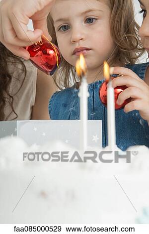 Girl celerating family View Large Photo Image Stock Photo - Girl celerating family. Fotosearch