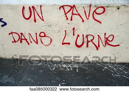 Graffiti on wall reading "un pave dans l'urne" View Large Photo Image Stock Image - Graffiti on wall reading "un pave dans l'urne". Fotosearch