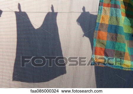 Laundry hanging on clothes-line View Large Photo Image Picture - Laundry hanging on clothes-line. Fotosearch