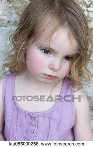 Little girl looking away sadly, portrait View Large Photo Image Stock Photograph - Little girl looking away sadly, portrait. Fotosearch