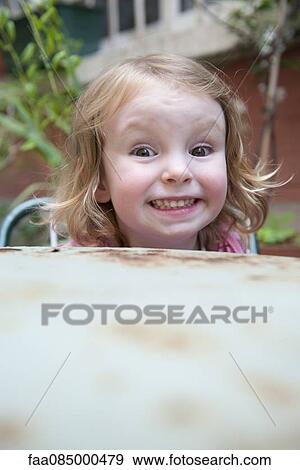 Stock Photo - Little girl, smiling. Fotosearch