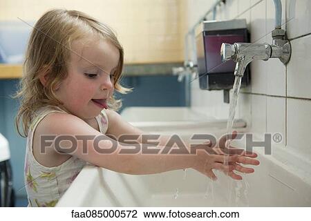 Little girl washing hands View Large Photo Image Stock Image - Little girl washing hands. Fotosearch