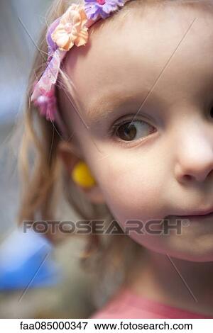 Stock Photo - Little girl with headband, cropped. Fotosearch