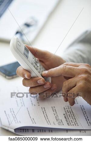 Man holding cell phone, cropped View Large Photo Image Stock Photo - Man holding cell phone, cropped. Fotosearch