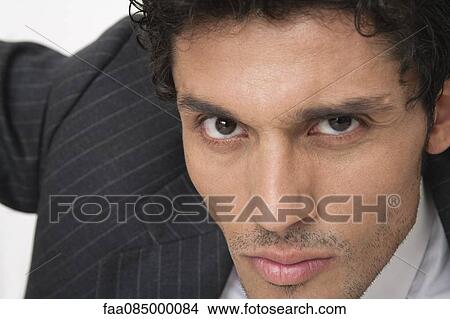 Mid-adult businessman, close-up View Large Photo Image Picture - Mid-adult businessman, close-up. Fotosearch