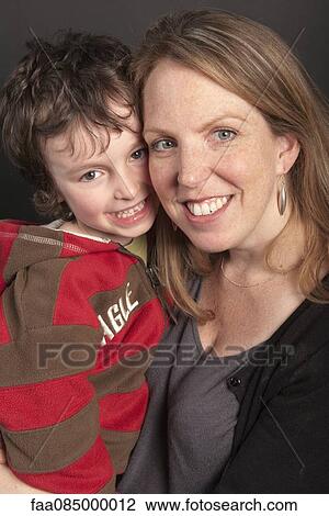 Mother and son, portrait View Large Photo Image Stock Image - Mother and son, portrait. Fotosearch