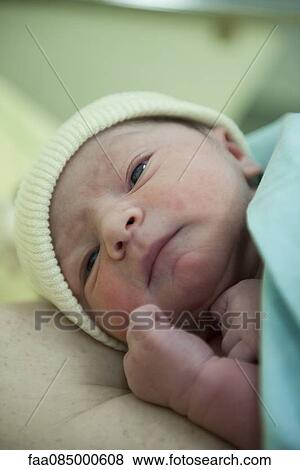 Stock Photo - Newborn baby. Fotosearch