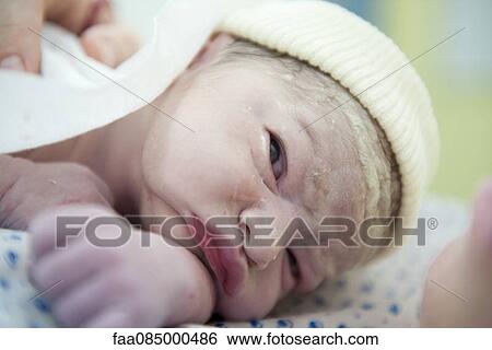 Stock Photograph - Newborn baby. Fotosearch