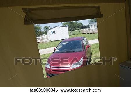 Stock Photography - Parked car viewed through window. Fotosearch