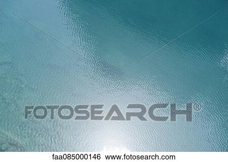 Stock Photograph - Rippled water surface. Fotosearch