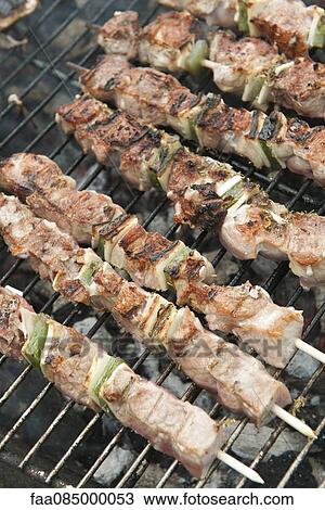 Shish kebabs on grill View Large Photo Image Stock Image - Shish kebabs on grill. Fotosearch