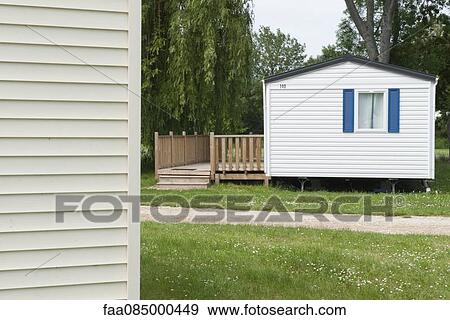 Stock Photo - Small house with deck. Fotosearch