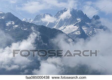 Snow-capped mountains View Large Photo Image Stock Photo - Snow-capped mountains. Fotosearch