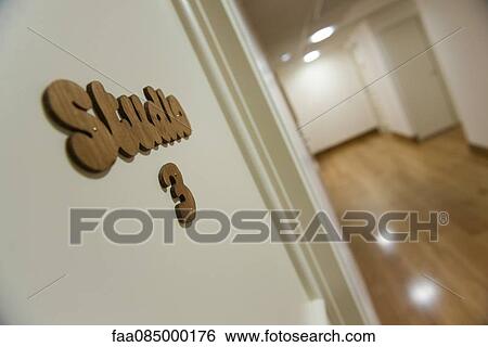 Stock Photograph - Studio 3 sign hanging in corridor. Fotosearch