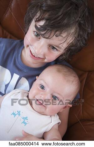 Young siblings, portrait View Large Photo Image Picture - Young siblings, portrait. Fotosearch