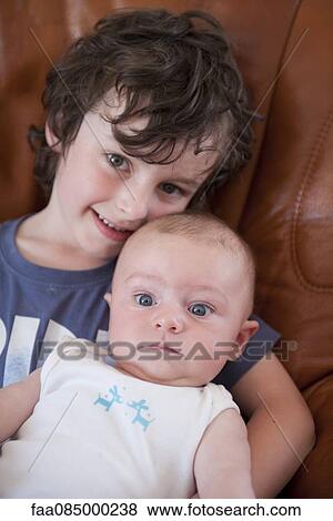 Young siblings, portrait View Large Photo Image Stock Photo - Young siblings, portrait. Fotosearch
