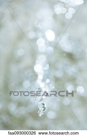 Stock Photograph - Bubbles in water, close-up. Fotosearch