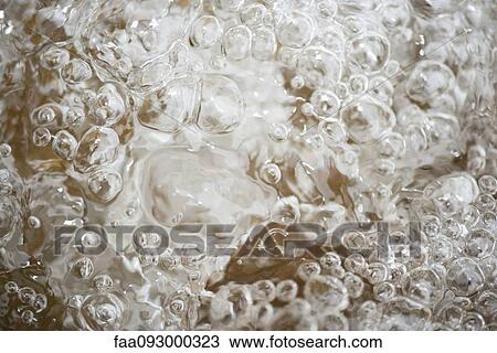 Bubbles on surface of water, full frame View Large Photo Image Stock Image - Bubbles on surface of water, full frame. Fotosearch