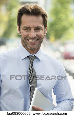 Stock Photograph - Businessman on the move. Fotosearch