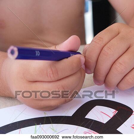 Child coloring with colored pencil, cropped View Large Photo Image Stock Image - Child coloring with colored pencil, cropped. Fotosearch