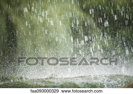 Drops splashing on rocks View Large Photo Image Stock Photo - Drops splashing on rocks. Fotosearch