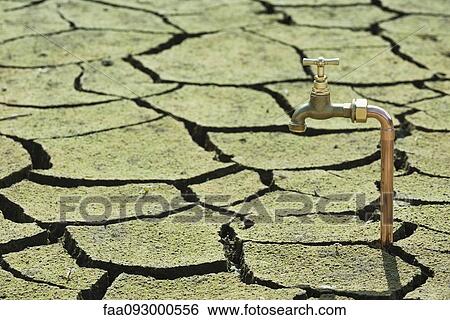 Faucet emerging from dry, cracked earth View Large Photo Image Stock Photograph - Faucet emerging from dry, cracked earth. Fotosearch