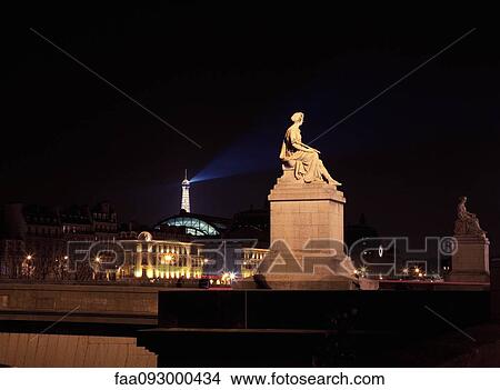 Picture - France, Paris, statue illuminated at night. Fotosearch