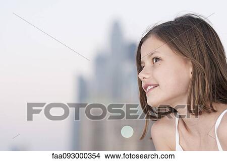 Girl looking away, side view View Large Photo Image Picture - Girl looking away, side view. Fotosearch