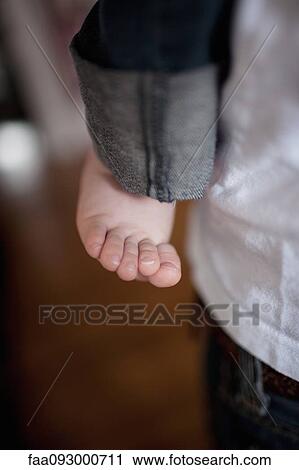 Stock Image - Infant's bare foot. Fotosearch