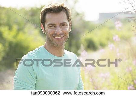 Mature man enjoying outdoors, portrait View Large Photo Image Stock Image - Mature man enjoying outdoors, portrait. Fotosearch