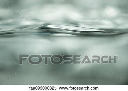 Stock Photography - Rippled surface of water, close-up. Fotosearch