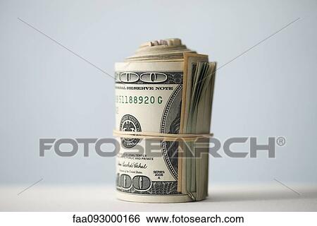 Roll of one-hundred dollar bills View Large Photo Image Stock Photograph - Roll of one-hundred dollar bills. Fotosearch
