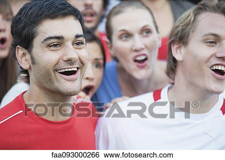 Stock Photograph - Spectators at sports match. Fotosearch