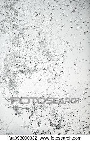 Stock Image - Underwater view of water splashing. Fotosearch