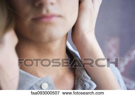 Stock Photo - Woman caressing man's face, cropped. Fotosearch
