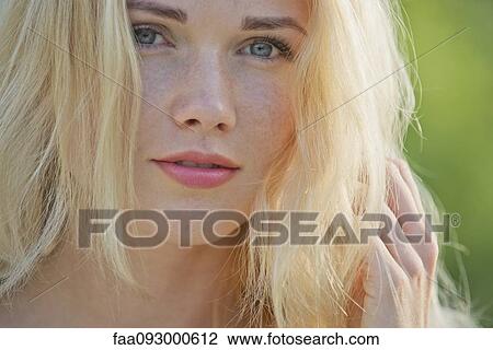 Stock Image - Young woman, close-up. Fotosearch