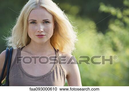 Stock Image - Young woman, portrait. Fotosearch