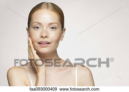Stock Photo - Young woman, portrait. Fotosearch