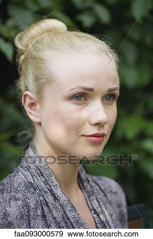 Stock Photo - Young woman, portrait. Fotosearch