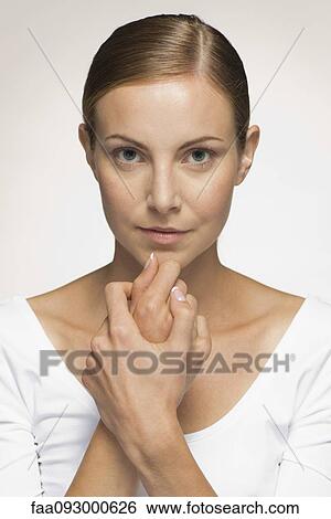Young woman, portrait View Large Photo Image Stock Photograph - Young woman, portrait. Fotosearch