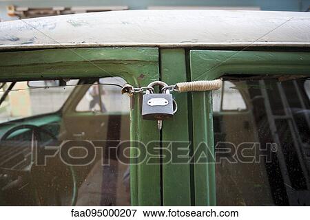 Stock Photo - Car locked with padlock. Fotosearch