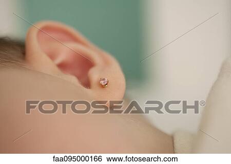 Close-up of baby's ear, cropped View Large Photo Image Stock Photograph - Close-up of baby's ear, cropped. Fotosearch