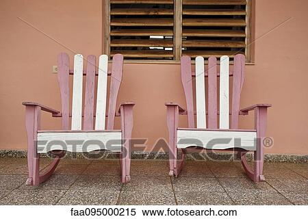 Colorful rocking chairs View Large Photo Image Stock Photography - Colorful rocking chairs. Fotosearch