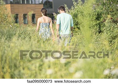 Couple together on walk View Large Photo Image Stock Image - Couple together on walk. Fotosearch