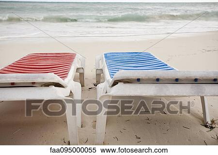 Deckchairs on beach View Large Photo Image Stock Photography - Deckchairs on beach. Fotosearch