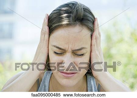 Distressed woman with head in hands View Large Photo Image Stock Photography - Distressed woman with head in hands. Fotosearch