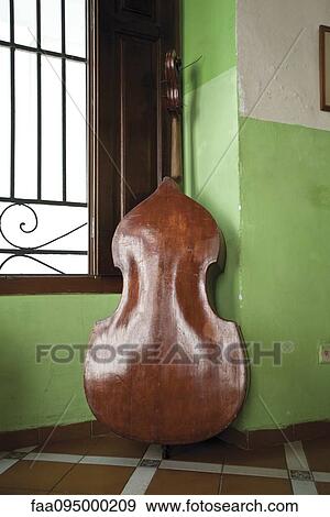 Double bass leaned against window View Large Photo Image Stock Photo - Double bass leaned against window. Fotosearch