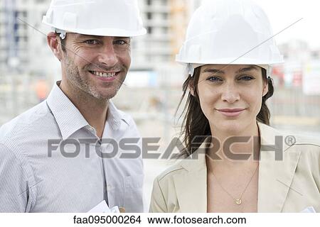 Picture - Engineers at construction site. Fotosearch