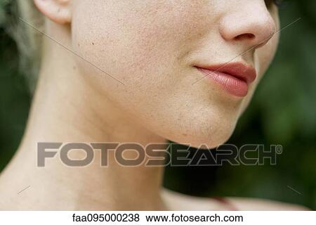 Face of young woman, cropped View Large Photo Image Stock Photo - Face of young woman, cropped. Fotosearch