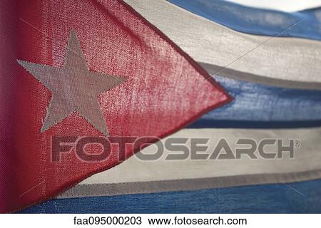 Light shining through Cuban flag, full frame View Large Photo Image Stock Image - Light shining through Cuban flag, full frame. Fotosearch